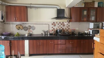 Kitchen in 4 BHK Apartment at Mahagun Moderne, Sector 78 – for Rent