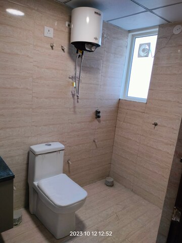 Bathroom in Studio Apartment at Okay Plus Solitaire Suites, Ramnagariya – for Rent