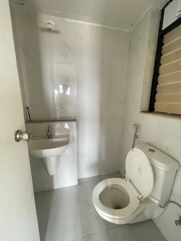 Bathroom in 2 BHK Apartment at Runwal Gardens Phase 2, Dombivli East – for Rent