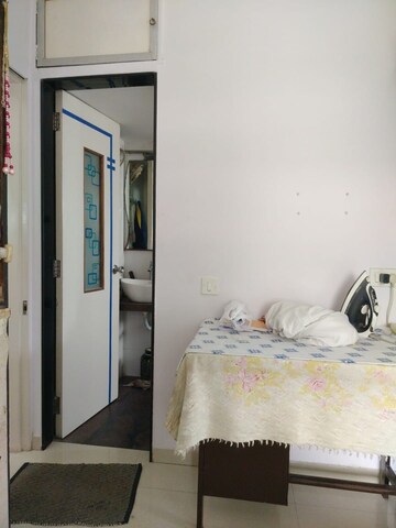 Bedroom in 2 BHK Apartment at Dhanlaxmi Apartment Dadar East, Dadar East – for Rent