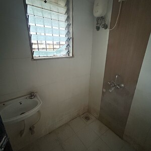 Bathroom in 1 BHK Apartment at Raunak Unnathi Greens Phase VII, Haware City – for Sale