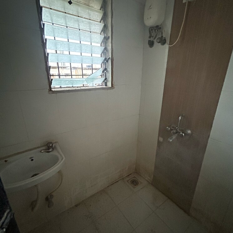 Bathroom, raunak-unnathi-greens-phase-vii 1 Bedroom 600 Sq.Ft. Apartment In Haware City Thane 8673070