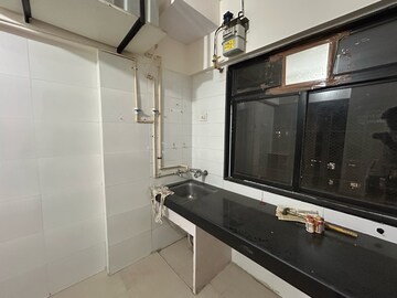 Kitchen in 2 BHK Apartment at Vijay Garden Ghodbunder, Kavesar – for Rent