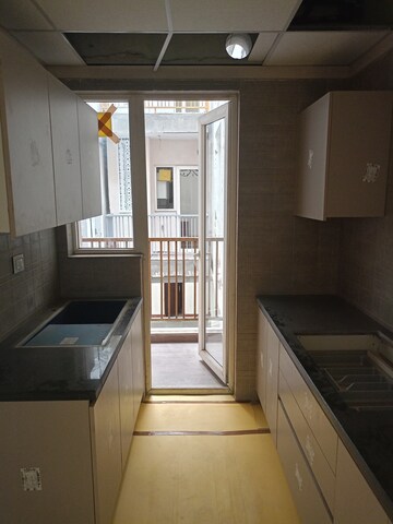 Kitchen in 3 BHK Apartment at Orris Woodview Residencies, Sector 89 – for Sale