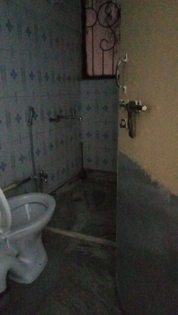 Bathroom in 1 BHK Apartment at RWA Qutab Enclave, Katwaria Sarai – for Rent