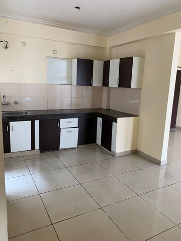 Kitchen in 2 BHK Apartment at Panchsheel Greens, Sector 16 Greater Noida – for Sale