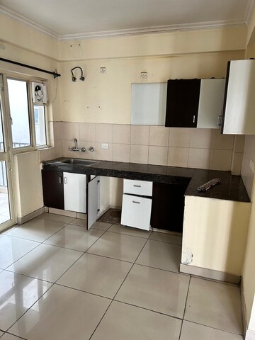Kitchen in 2 BHK Apartment at Panchsheel Greens, Sector 16 Greater Noida – for Sale