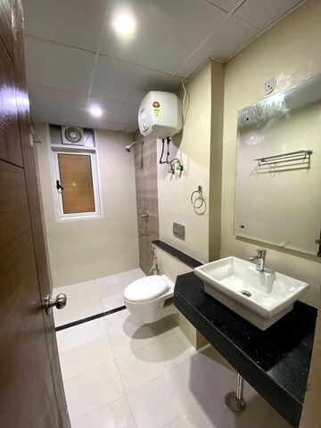 Bathroom in 4 BHK Apartment at Prateek Edifice, Sector 107 – for Rent