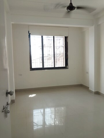 Room in 2 BHK Apartment at Ganesh CHS Andheri West, Andheri West – for Rent