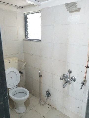 Bathroom in 2 BHK Apartment at Ganesh CHS Andheri West, Andheri West – for Rent
