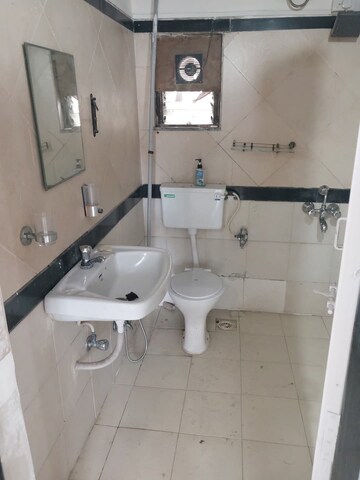 Bathroom in 2 BHK Apartment at Ganesh CHS Andheri West, Andheri West – for Rent