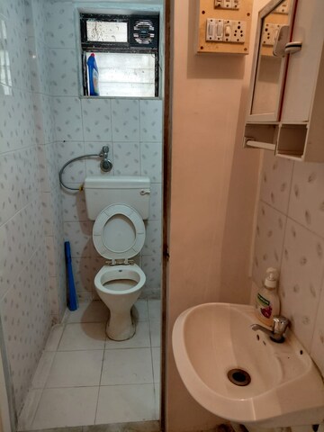 Bathroom in 1 BHK Apartment at Dadarkar Building, Dadar West – for Rent