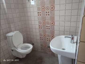 Bathroom in 2 BHK Apartment at The Mall Avenue – for Rent