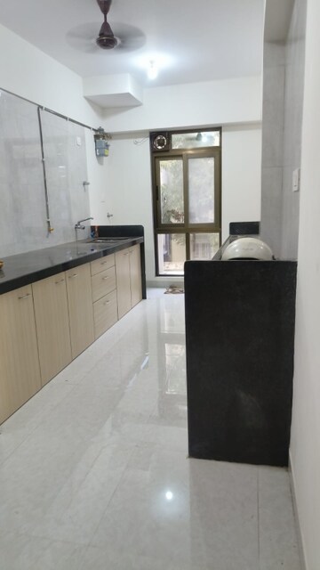 Kitchen in 2 BHK Apartment at Atmiya Centria, Santacruz East – for Rent