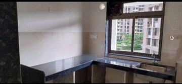 Kitchen in 2 BHK Apartment at Runwal Eirene, Balkum Pada – for Rent