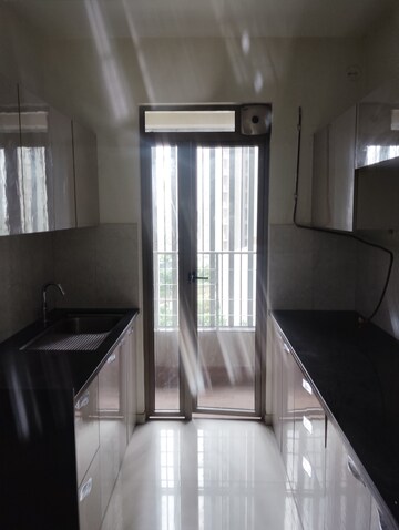 Living Room in 2 BHK Apartment at Kalpataru Paramount, Kapur Bawdi – for Rent