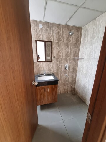 Bathroom in 2 BHK Apartment at Shapoorji Pallonji Joyville Gurgaon, Sector 102 – for Rent