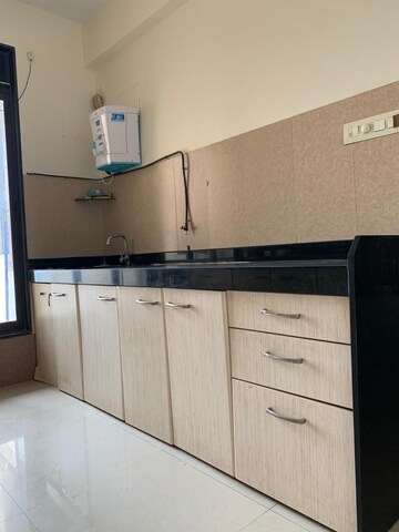 Kitchen in 2 BHK Apartment at Rustomjee Elanza, Malad West – for Rent