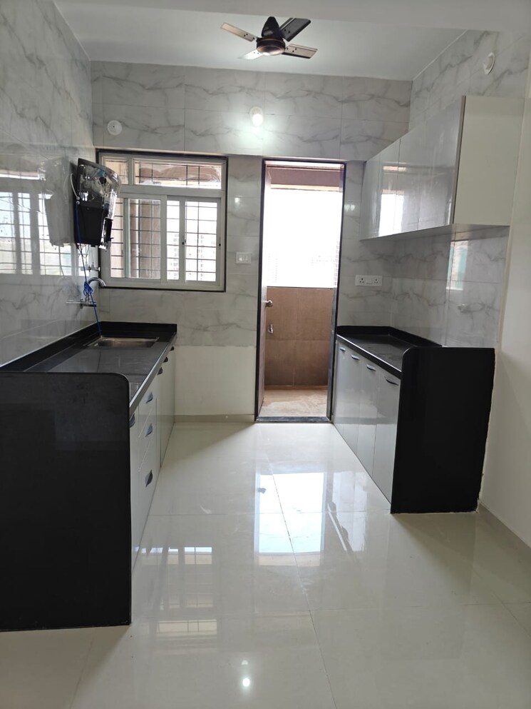 Kitchen, veddant-ganesh-bella-rossa-phase-2 2 Bedroom 635 Sq.Ft. Apartment In Punawale Pune 8673886