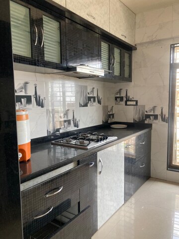 Kitchen in 3 BHK Apartment at Paradise Sai Spring, Kharghar Sector 35g – for Sale