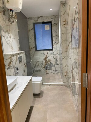 Bathroom in 4 BHK Builder Floor at Unitech Greenwood City Apartment, Sector 45 – for Sale