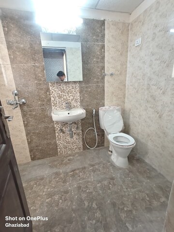 Bathroom in 2 BHK Apartment at Gaur City 2 - 12th Avenue, Sector 16c Greater Noida – for Rent