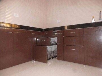 Kitchen in 2 BHK Apartment at Cosmos Jewels, Ghodbunder Road – for Sale