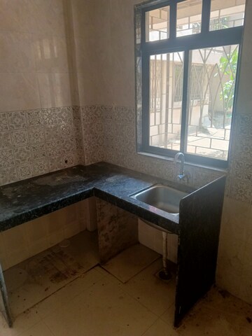 Kitchen in 1 BHK Apartment at Ajmera Vishwa Nagri, Vasai East – for Rent