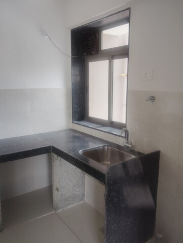 Kitchen in 2 BHK Apartment at Runwal Eirene, Balkum Pada – for Rent