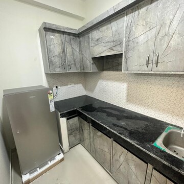 Kitchen in 1 BHK Apartment at VVIP Nest, Raj Nagar Extension – for Rent