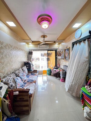 Living Room in 1 BHK Apartment at Kalpataru Garden, Nalasopara West – for Sale