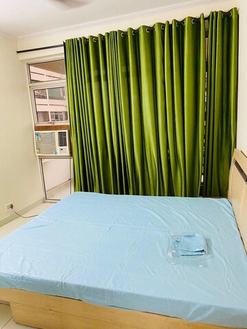 Bedroom in 4 BHK Apartment at Ansal Sushant Estate, Sector 52 – for Rent