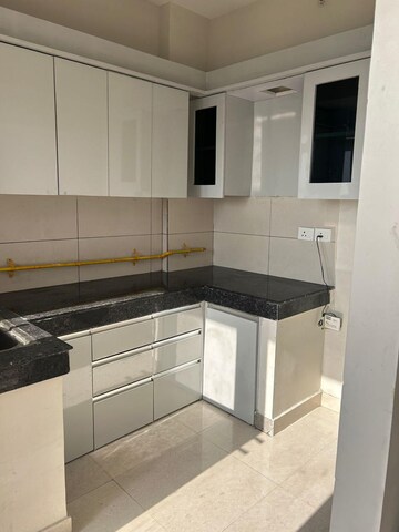 Kitchen in 2 BHK Apartment at Tata Eureka Park, Sector 150 – for Rent