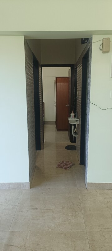 Building Lobby in 1 BHK Apartment at Tulsi Aura Mumbai, Ghansoli – for Rent