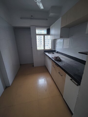 Kitchen in 1 BHK Apartment at Puranik Rumah Bali, Ghodbunder Road – for Rent