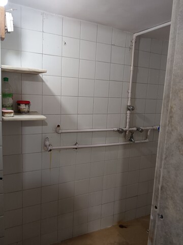 Bathroom in 1 BHK Apartment at Pawan Baug CHS, Malad West – for Rent