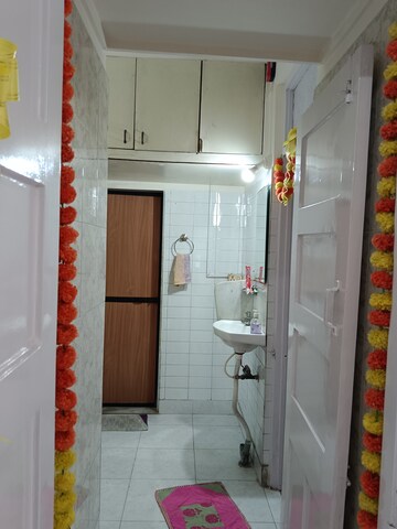 Bathroom in 1 BHK Apartment at Pawan Baug CHS, Malad West – for Rent