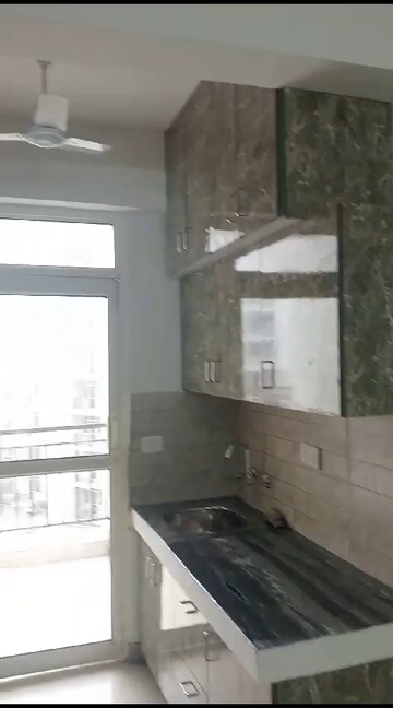 Kitchen in 2 BHK Apartment at Suncity Avenue 76, Sector 76 – for Rent