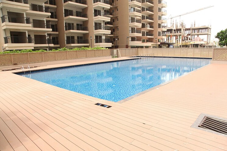Swimming Pool, gaur-atulyam 2 Bedroom 1040 Sq.Ft. Apartment In Omicron I Greater Noida Greater Noida 8675052