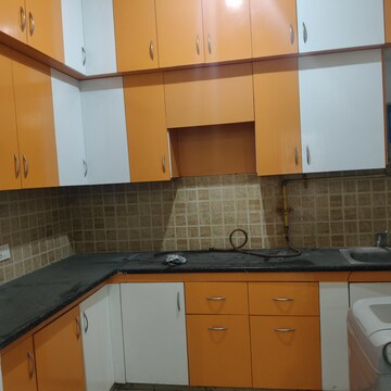 Kitchen in 2 BHK Apartment at Mahagun Mywoods II, Sector 16c Greater Noida – for Rent