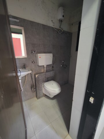 Bathroom in 2 BHK Apartment at Squarefeet Grand Square, Anand Nagar – for Rent