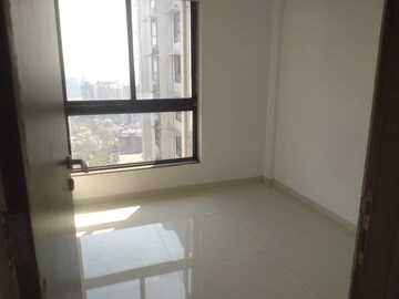 Room in 2 BHK Apartment at Lotus Sky Garden, Malad West – for Rent
