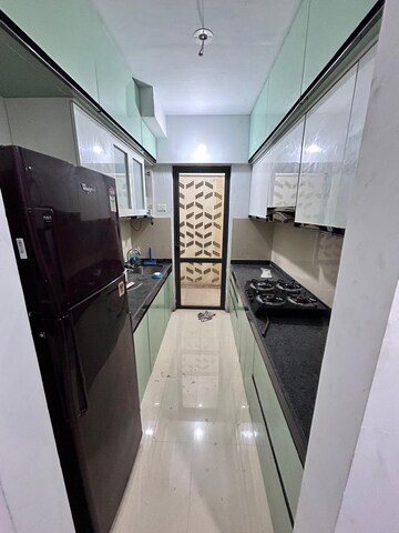 Kitchen in 2 BHK Apartment at Lodha Lakeshore Greens, Dombivli East – for Rent
