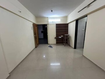 Living Room in 2 BHK Apartment at Shree Chitrakut CHS, Dahisar East – for Rent