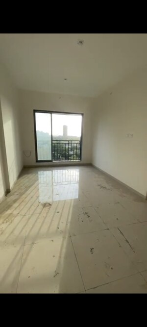 Room in 2 BHK Apartment at Shivam Gulmohar, Goregaon West – for Sale