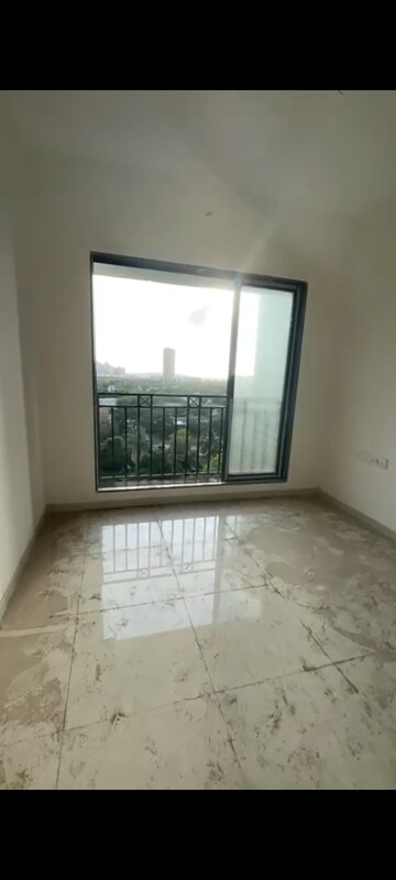 Room in 2 BHK Apartment at Shivam Gulmohar, Goregaon West – for Sale