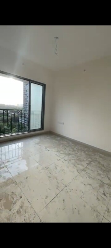 Room in 2 BHK Apartment at Shivam Gulmohar, Goregaon West – for Sale