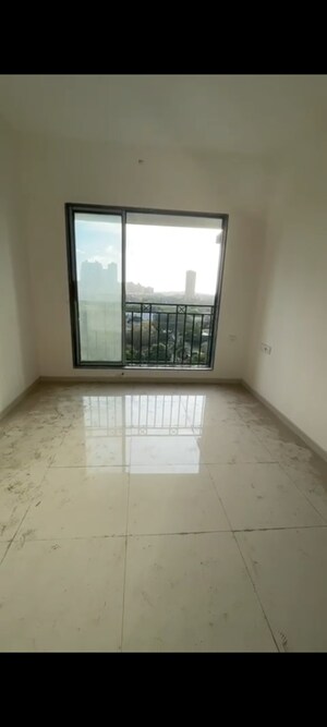 Room in 2 BHK Apartment at Shivam Gulmohar, Goregaon West – for Sale