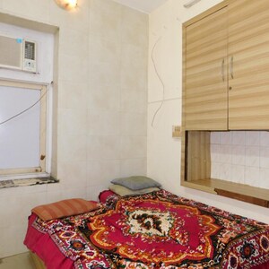 Bedroom in 2 BHK Apartment at Sarswati Building, Cawasji Patel Tank – for Rent