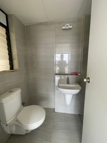 Bathroom in 1 BHK Apartment at Runwal Gardens Phase I, Dombivli East – for Rent